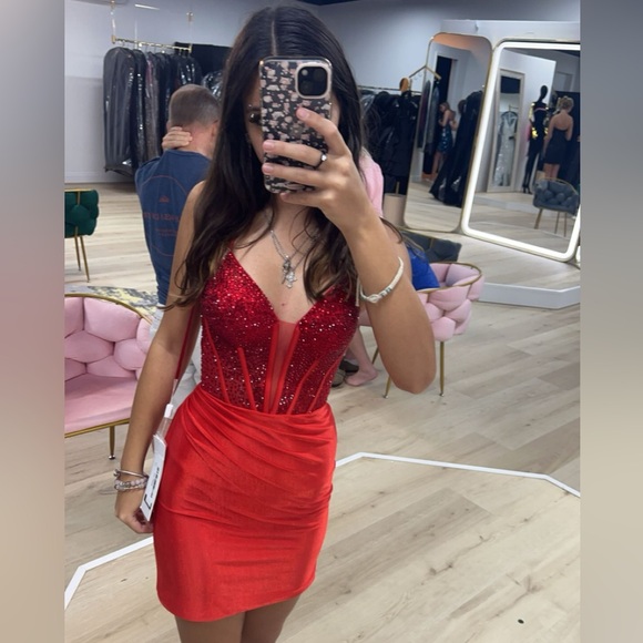 I will no longer need this dress it still has the tag and only worn once. - Picture 2 of 3